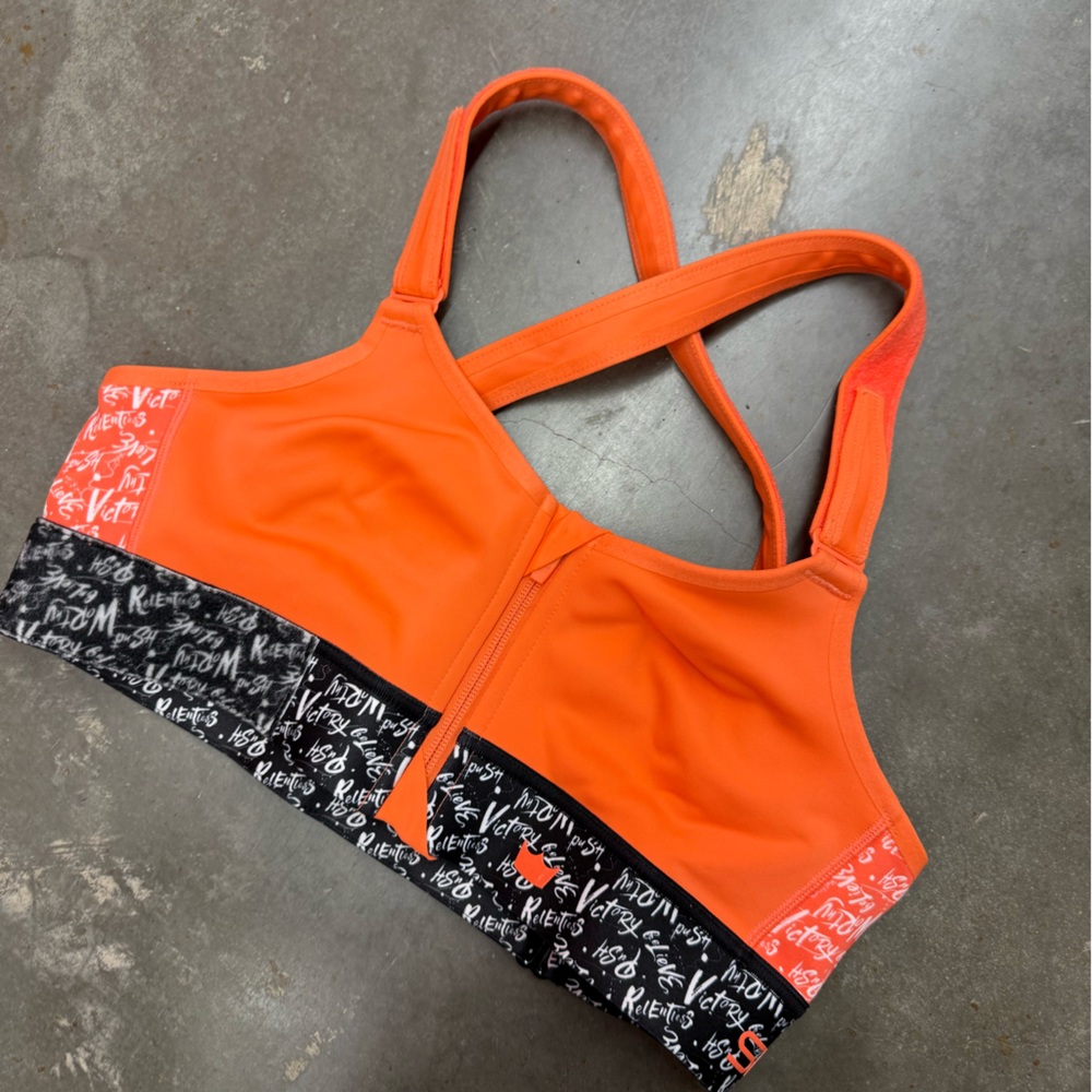 SHEFIT Orange and Black Sports Bra with Patterned Band